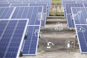 Solar cells have various symbols such as electric car charging station, robot, inverter, energy saving industry above the solar panels. photo