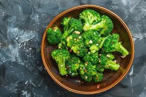 Flavorful Broccoli with Garlic and Parsley Cooked in Brown Container photo