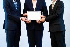 Photograph of the atmosphere during the ceremony of awarding an institution's certificate to trainees who have passed the test. photo