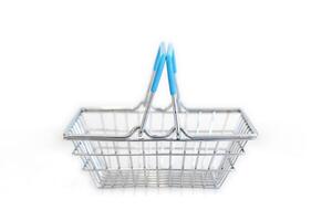 Symbolic of shopping online, the empty mini basket on white background. photo