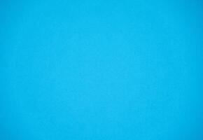 This is for minimal object background. A few mottled bright turquoise blue green paper solid plain photo