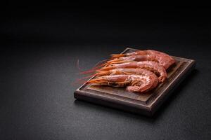 Tiger shrimp or langoustine boiled with spices and salt photo