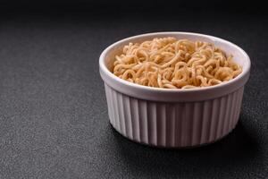 Asian dish rice noodles with salt and spices photo