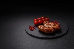 Grilled pork or chicken sausages with salt, spices and herbs photo