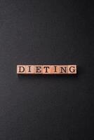Inscription Diet wooden cubes, conceptual background with copy space photo