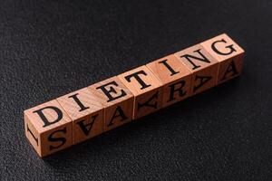 Inscription Diet wooden cubes, conceptual background with copy space photo