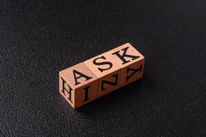 Inscription ASK wooden cubes, concept background with copy space photo