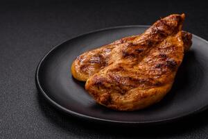 Delicious fresh grilled chicken fillet with spices and herbs photo