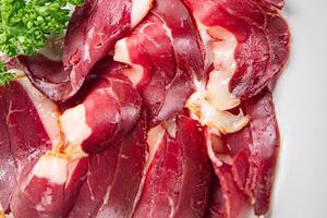 duck breast magret smoked poultry fresh meal food snack on the table copy space food background rustic top view photo