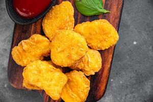 nuggets chicken meat deep fried fresh meal food snack on the table copy space food background rustic top view photo