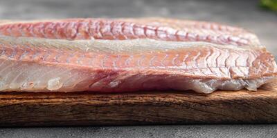 fillet raw white fish cod or halibut fresh meal food snack on the table copy space food background rustic top view photo