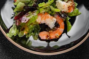 shrimp salad prawns or langoustines green leaf lettuce mix fresh meal food snack on the table copy space food background rustic top view photo