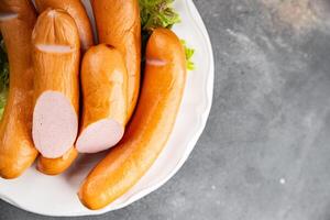 smoked sausages meat pork or chicken, turkey fresh meal food snack on the table copy space food background rustic top view photo