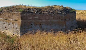 The ruins of the ancient Arabat fortress in the eastern Crimea on the shore of the Sea of Azov photo