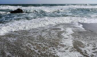Stormy sea, waves and white foam on the surface, Black Sea photo