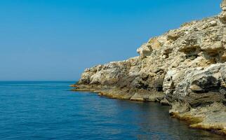 Coastal limestone cliffs on Atlesh in Crimea, Tarkhankut photo