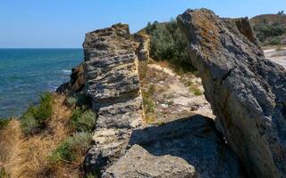 An old abandoned stone quarry where shell rock was mined for construction, eastern Crimea photo