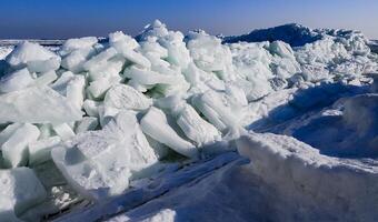 Ice Climatic collapse, heaps of ice blocks on the piers and the shore. The Black Sea near Odessa is frozen photo