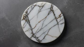 White empty marble texture round board on grey background Top view Copy space. photo