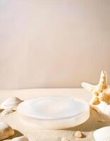 White podium with seashells and starfish on beige background photo