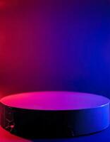 Black Round Platform on Red and Blue Gradient Background photo