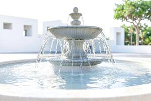Tranquil Water Feature in a White Setting photo