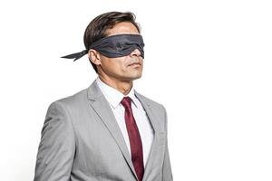 Blindfolded Businessman in Suit photo