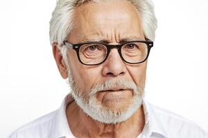 Portrait of a Senior Man with a Skeptical Expression photo