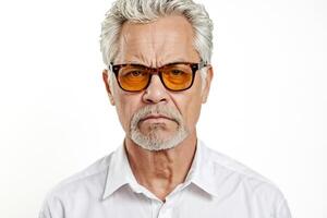 Portrait of a serious man with a beard and glasses photo