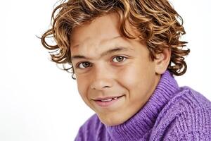 Portrait of a smiling boy with curly hair photo