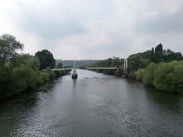 a river with a bridge over it photo