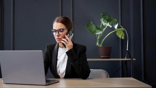 Middle-aged Business woman working in office with documents and laptop people. Consulting and business planning. Creative startup, digital tech for research, website and discussion. photo