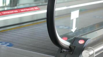 Closeup of an escalator handrail on a public moving walkway, showcasing accessibility and design video