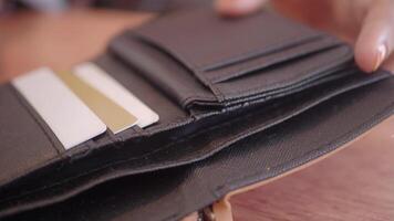 man hand taking credit card out from a wallet video