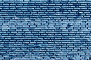 The background of the old blue brick wall for design interior and various scenes or as a background for interviews. photo