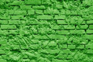 Green brick building wall. Interior of a modern loft. Background for design and interview recording. photo