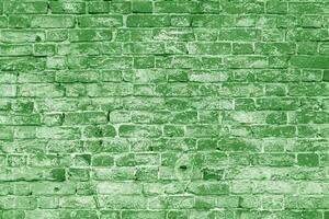 Green brick building wall. Interior of a modern loft. Background for design and interview recording. photo