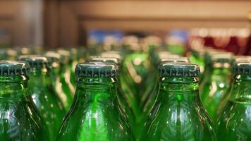 Close-up of Bottled Juices in Refrigerator Display, Brightly Lit in Grocery Store video