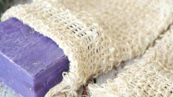 natural soap bar in a soap bar bag on table video