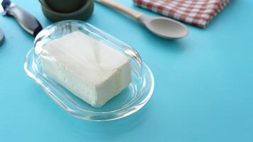 fresh butter in a glass jar on table video