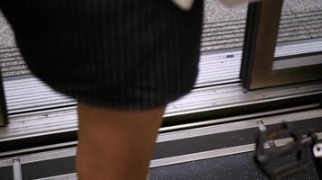pov to gate door of skytrain public transportation while door is open and passengers get off the train commuter video