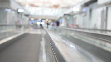 selective focus on escalator handheld of walkway escalator inside airport departure terminal video