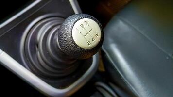 View of black manual car gear shift photo