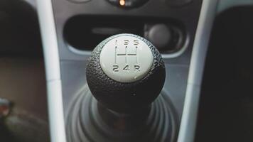 View of black manual car gear shift photo