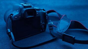 Close up view camera with blue effect photo