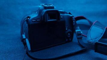 Close up view camera with blue effect photo