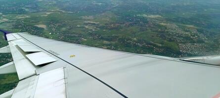 The view outside the plane if you look from the window photo
