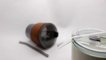 Tumbler in the form of a glass or glass mug with a modern design photo