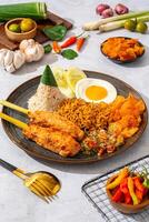 sate lilit is a satay variant in Indonesia, originating from Balinese cuisine. This satay is made from minced chicken and spiced minced meat is wound around lemongrass sticks then grilled on charcoal photo