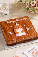 Homemade brownies. A chocolate brownie is a chocolate baked confection. photo